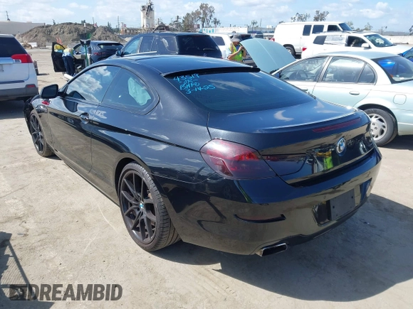 2013 BMW 6 Series 650i with VIN WBAYM9C57DDW20178, listed as a IAAI auction lot 41933561 with 72,886 mi miles and . Bid and sale history available at carsss.com. Image 3.