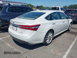 2014 Toyota Avalon Limited with VIN 4T1BK1EB0EU122498, listed as a IAAI auction lot 40248080 with 126,818 mi miles and . Bid and sale history available at DreamBid. Image 4.