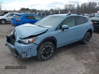 2022 Subaru Crosstrek Premium z VIN JF2GTACC4NG279633, wystawiony jako IAAI lot #42028843 z przebiegiem 38 450 mil mil oraz . Historia ofert i sprzedaży dostępna na DreamBid. Obrazek 2.