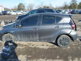 2015 Toyota Prius c One with VIN JTDKDTB36F1113749, listed as a IAAI auction lot 41366238 with 121,610 mi miles. Bid and sale history available at carsss.com. Image 14.