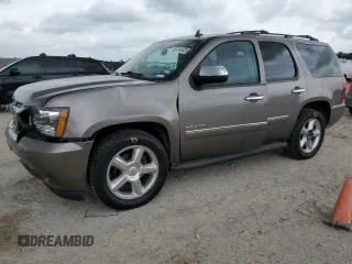 2012 Chevrolet Tahoe LTZ z VIN 1GNSCCE02CR259655, wystawiony jako Copart lot #55184505 z przebiegiem 199 189 mil mil oraz Szkoda całkowita • Salvage title. Historia ofert i sprzedaży dostępna na DreamBid. Obrazek 1.