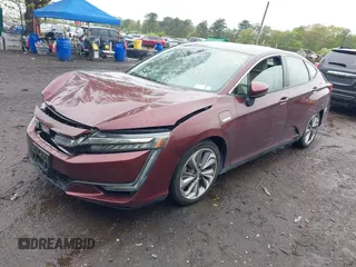 2018 Honda Clarity z VIN JHMZC5F12JC021958, wystawiony jako IAAI lot #42191071 z przebiegiem 29 423 mil mil oraz . Historia ofert i sprzedaży dostępna na DreamBid. Obrazek 18.