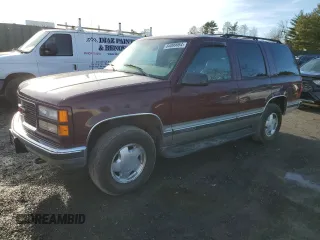 1999 GMC Yukon with VIN 1GKEK13R2XJ728279, listed as a Copart auction lot 84099064 with 162,131 mi miles and Clean Title. Bid and sale history available at carsss.com. Image 1.