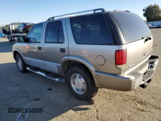 2000 GMC Jimmy SL with VIN 1GKCS13W9Y2341317, listed as a Copart auction lot 43249705 with 160,889 mi miles and Clean Title. Bid and sale history available at carsss.com. Image 2.