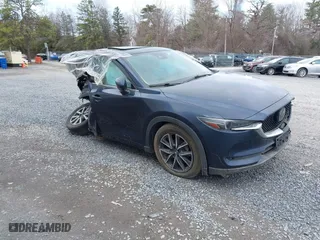 2018 Mazda CX-5 Grand Touring with VIN JM3KFBDM5J0313103, listed as a IAAI auction lot 35896676 with 43,918 mi miles. Bid and sale history available at carsss.com. Image 1.