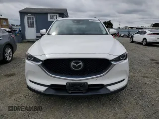 2020 Mazda CX-5 Touring with VIN JM3KFACM0L0857278, listed as a Copart auction lot 51980825 with 73,411 mi miles and Salvage Title. Bid and sale history available at carsss.com. Image 5.
