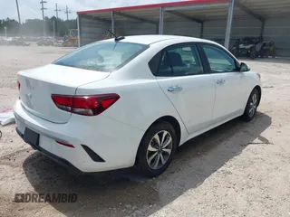 2023 Kia Rio S with VIN 3KPA24AD4PE528715, listed as a IAAI auction lot 41912848 with 11,546 mi miles. Bid and sale history available at carsss.com. Image 4.