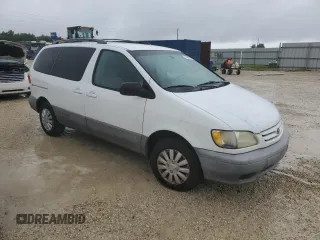 2001 Toyota Sienna LE with VIN 4T3ZF13C21U369506, listed as a Copart auction lot 74561634 with 0 mi miles and Salvage Title. Bid and sale history available at carsss.com. Image 4.