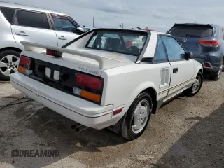 1986 Toyota MR2 z VIN JT2AW15C7G0083196, wystawiony jako Copart lot #74149374 z przebiegiem 30 771 mil mil oraz Nie do naprawy. Historia ofert i sprzedaży dostępna na DreamBid. Obrazek 3.