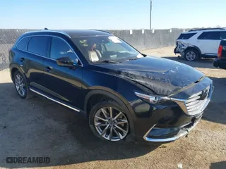 2018 Mazda CX-9 Signature with VIN JM3TCBEY2J0207786, listed as a IAAI auction lot 41478330 with 99,311 mi miles. Bid and sale history available at carsss.com. Image 1.