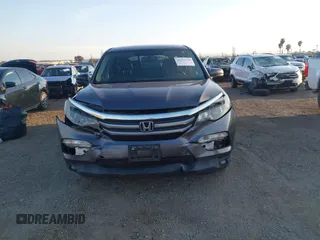 2017 Honda Pilot EX-L with VIN 5FNYF5H74HB010026, listed as a IAAI auction lot 41633770 with 170,383 mi miles and . Bid and sale history available at DreamBid. Image 13.