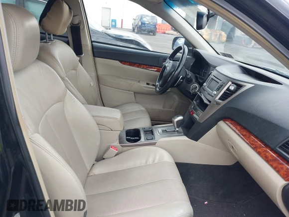 2012 Subaru Outback 2.5i Limited with VIN 4S4BRBKC6C3287232, listed as a IAAI auction lot 41907801 with 213,802 mi miles. Bid and sale history available at carsss.com. Image 5.