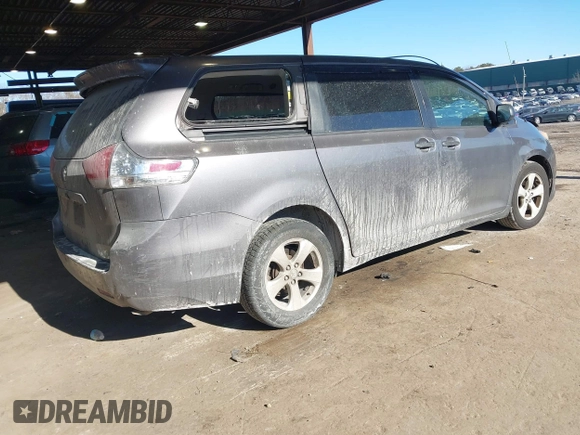 2011 Toyota Sienna with VIN 5TDZK3DC0BS075319, listed as a IAAI auction lot 41458855 with 211,583 mi miles. Bid and sale history available at carsss.com. Image 4.