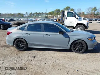 2025 Honda Civic Sport with VIN 2HGFE2F5XSH521799, listed as a IAAI auction lot 41831110 with 5,406 mi miles and . Bid and sale history available at DreamBid. Image 13.
