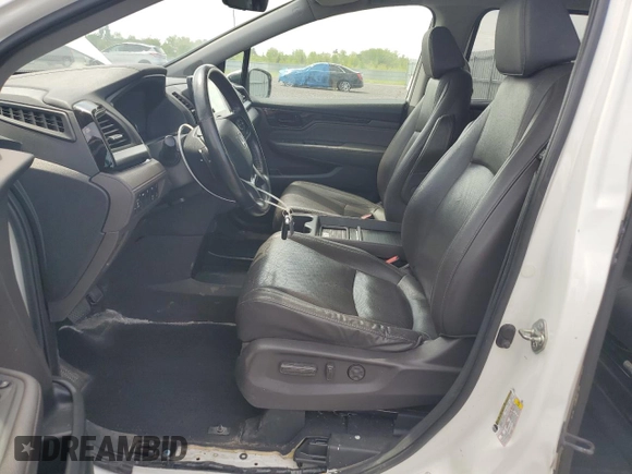 2019 Honda Odyssey Touring z VIN 5FNRL6H80KB501681, wystawiony jako Copart lot #58814945 z przebiegiem 105 287 mil mil oraz Szkoda całkowita • Salvage title. Historia ofert i sprzedaży dostępna na DreamBid. Obrazek 7.