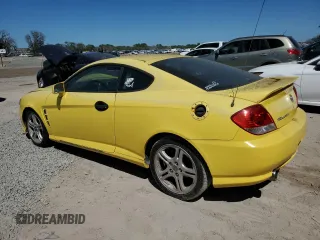 2006 Hyundai Tiburon GT z VIN KMHHN65F96U203308, wystawiony jako Copart lot #47278684 z przebiegiem 186 123 mil mil oraz Szkoda całkowita • Salvage title. Historia ofert i sprzedaży dostępna na DreamBid. Obrazek 2.
