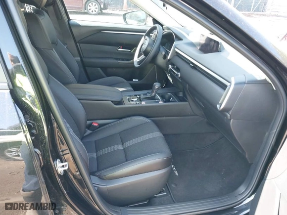2025 Mazda CX-50 2.5 S Preferred Package with VIN 7MMVABBM8SN340971, listed as a IAAI auction lot 41934546 with 3,900 mi miles. Bid and sale history available at carsss.com. Image 5.