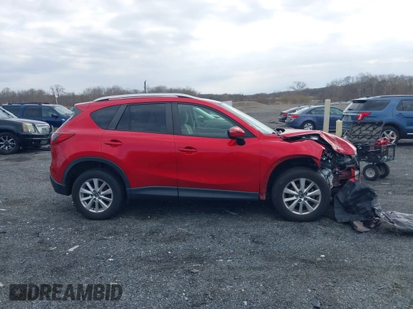 2015 Mazda CX-5 Touring with VIN JM3KE2CY7F0533731, listed as a IAAI auction lot 41876211 with 1 mi miles. Bid and sale history available at carsss.com. Image 12.