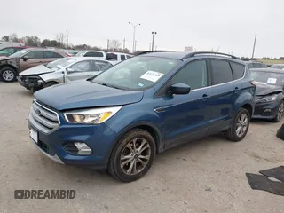 2018 Ford Escape SE with VIN 1FMCU0GD0JUC58115, listed as a IAAI auction lot 41578309 with 76,162 mi miles. Bid and sale history available at carsss.com. Image 2.