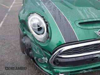 2020 MINI Hardtop Cooper S z VIN WMWXR5C08L2L85651, wystawiony jako IAAI lot #41521346 z przebiegiem 40 863 mil mil oraz . Historia ofert i sprzedaży dostępna na DreamBid. Obrazek 6.