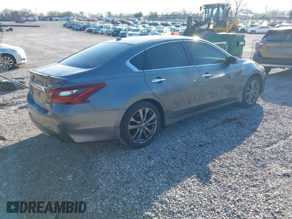 2018 Nissan Altima 2.5 SR with VIN 1N4AL3AP7JC240029, listed as a IAAI auction lot 41883209 with 77,190 mi miles. Bid and sale history available at carsss.com. Image 4.