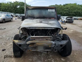 2007 Jeep Wrangler Unlimited Sahara z VIN 1J8GB59107L203053, wystawiony jako Copart lot #66549364 z przebiegiem Nie podano mil oraz Szkoda całkowita • Salvage title. Historia ofert i sprzedaży dostępna na DreamBid. Obrazek 5.