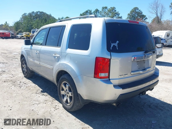 2011 Honda Pilot Touring with VIN 5FNYF4H91BB086712, listed as a IAAI auction lot 41809369 with 260,718 mi miles. Bid and sale history available at carsss.com. Image 3.