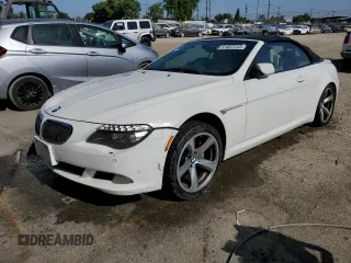2009 BMW 6 Series 650i z VIN WBAEB53599CX64121, wystawiony jako Copart lot #61087245 z przebiegiem 201 552 mil mil oraz Czysty tytuł • Clean title. Historia ofert i sprzedaży dostępna na DreamBid. Obrazek 1.