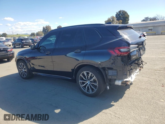 2023 BMW X5 xDrive45e with VIN 5UXTA6C03P9P44673, listed as a Copart auction lot 46477355 with 5,164 mi miles and Salvage Title. Bid and sale history available at carsss.com. Image 2.
