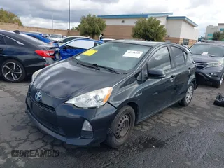 2014 Toyota Prius One with VIN JTDKDTB39E1071253, listed as a IAAI auction lot 41734442 with 233,895 mi miles and . Bid and sale history available at DreamBid. Image 2.