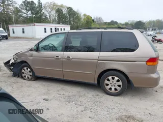 2004 Honda Odyssey EX with VIN 5FNRL18684B072343, listed as a IAAI auction lot 41945142 with 222,990 mi miles and . Bid and sale history available at DreamBid. Image 14.