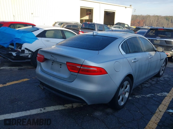 2018 Jaguar XE with VIN SAJAR4FN0JCP33509, listed as a IAAI auction lot 41105100 with 74,603 mi miles and . Bid and sale history available at DreamBid. Image 4.