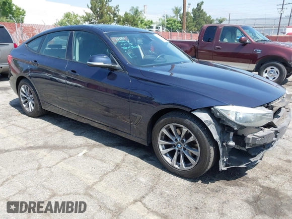 2014 BMW 3 Series 328i Gran Turismo xDrive z VIN WBA3X5C50ED557470, wystawiony jako IAAI lot #42606682 z przebiegiem 172 016 mil mil oraz . Historia ofert i sprzedaży dostępna na DreamBid. Obrazek 1.