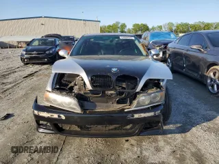 1999 BMW 5 Series 540i z VIN WBADN5339XGC91489, wystawiony jako Copart lot #52009545 z przebiegiem 229 003 mil mil oraz Szkoda całkowita • Salvage title. Historia ofert i sprzedaży dostępna na DreamBid. Obrazek 5.