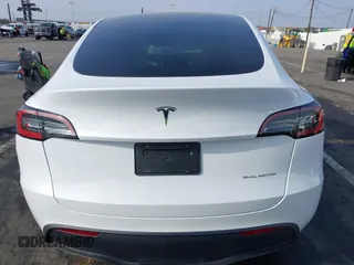 2023 Tesla Model Y Long Range with VIN 7SAYGDEE3PF900030, listed as a IAAI auction lot 41147192 with 13,903 mi miles and . Bid and sale history available at DreamBid. Image 15.