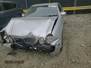 2001 Mercedes-Benz E-Class with VIN WDBJF65J71B201020, listed as a Copart auction lot 76067154 with 328,629 mi miles and Salvage Title. Bid and sale history available at carsss.com. Image 10.