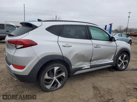 2018 Hyundai Tucson Value with VIN KM8J33A28JU748241, listed as a Copart auction lot 87492464 with 56,457 mi miles and Salvage Title. Bid and sale history available at carsss.com. Image 3.