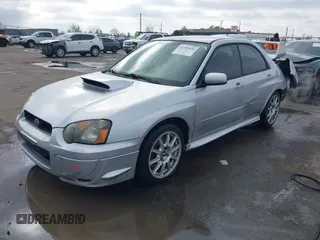 2005 Subaru Impreza Sedan (Natl) WRX STi w/Gold Wheels with VIN JF1GD70675L510065, listed as a IAAI auction lot 41092820 with 90,641 mi miles. Bid and sale history available at carsss.com. Image 2.