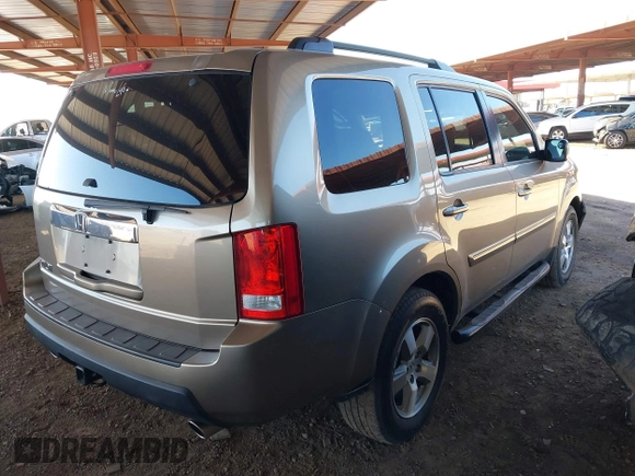 2011 Honda Pilot EX with VIN 5FNYF3H4XBB028225, listed as a IAAI auction lot 41873192 with 155,556 mi miles and . Bid and sale history available at carsss.com. Image 4.