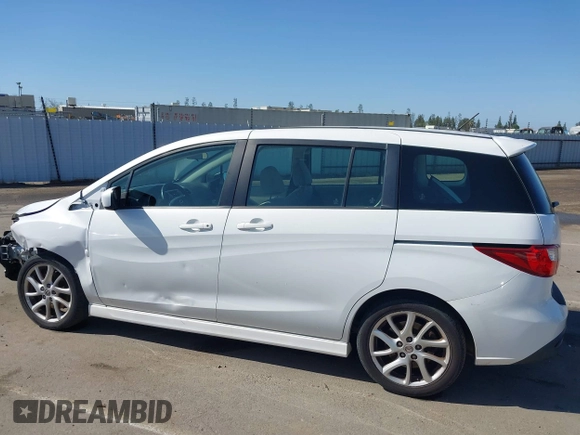 2012 Mazda 5 Touring with VIN JM1CW2CL7C0140452, listed as a IAAI auction lot 41970209 with 92,069 mi miles and . Bid and sale history available at DreamBid. Image 15.
