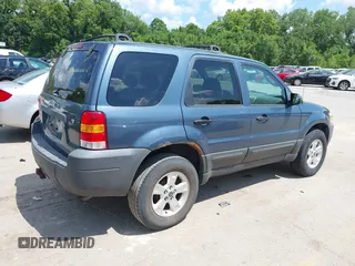 2006 Ford Escape XLT with VIN 1FMYU03156KA28848, listed as a IAAI auction lot 42670534 with 240,890 mi miles and . Bid and sale history available at DreamBid. Image 4.