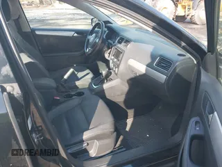 2012 Volkswagen Jetta Sedan SEL w/Sunroof with VIN 3VWLX7AJ2CM409673, listed as a IAAI auction lot 41860309 with 186,661 mi miles. Bid and sale history available at carsss.com. Image 5.