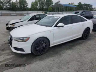 2013 Audi A6 Prestige с VIN WAUHGAFC0DN077835, выставлен на аукционе Copart как лот 59557105 с пробегом 128 516 миль миль и Списание • Salvage title. История ставок и продаж доступна на DreamBid. Изображение 1.