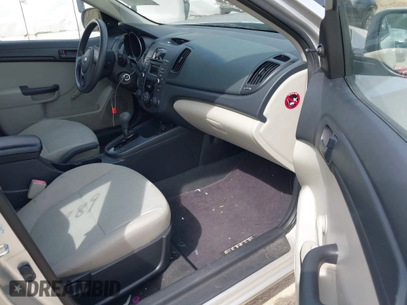 2010 Kia Forte LX with VIN KNAFT4A22A5108680, listed as a IAAI auction lot 42068889 with 77,329 mi miles. Bid and sale history available at carsss.com. Image 5.