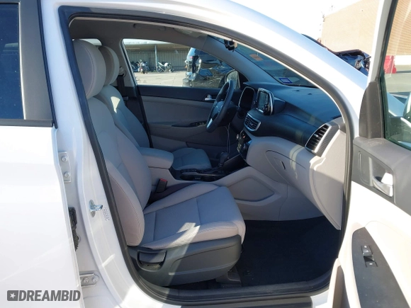 2020 Hyundai Tucson Sport with VIN KM8J33AL8LU251329, listed as a IAAI auction lot 41254246 with 61,626 mi miles. Bid and sale history available at carsss.com. Image 5.