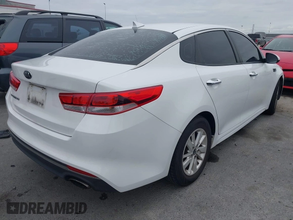 2016 Kia Optima LX with VIN 5XXGT4L32GG047624, listed as a IAAI auction lot 42068219 with 114,316 mi miles. Bid and sale history available at carsss.com. Image 4.