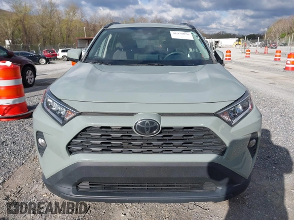 2019 Toyota RAV4 XLE with VIN 2T3P1RFV0KC014516, listed as a IAAI auction lot 41971856 with 94,447 mi miles and . Bid and sale history available at DreamBid. Image 12.