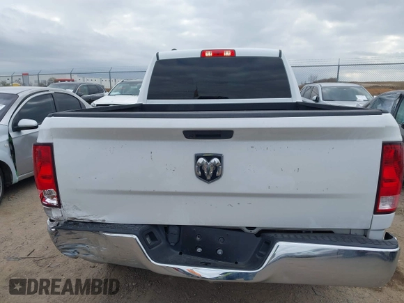 2021 Ram 1500 Tradesman with VIN 1C6RR6FG2MS506595, listed as a IAAI auction lot 41169146 with 43,726 mi miles and . Bid and sale history available at DreamBid. Image 16.