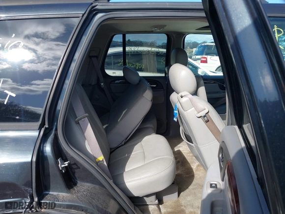 2005 GMC Envoy Denali with VIN 1GKET63M052336214, listed as a IAAI auction lot 41852417 with 999,999 mi miles. Bid and sale history available at carsss.com. Image 8.