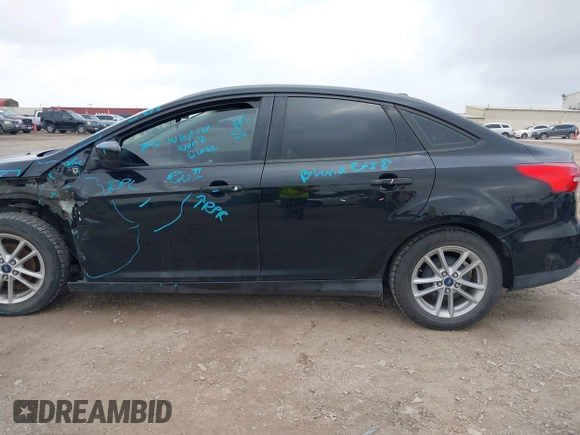 2018 Ford Focus SE with VIN 1FADP3F28JL302634, listed as a IAAI auction lot 42103219 with 71,682 mi miles and . Bid and sale history available at DreamBid. Image 15.